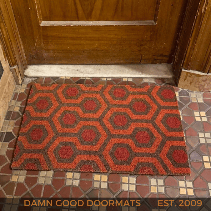 "orange and brown doormat pattern from the Overlook Hotel in The Shining"