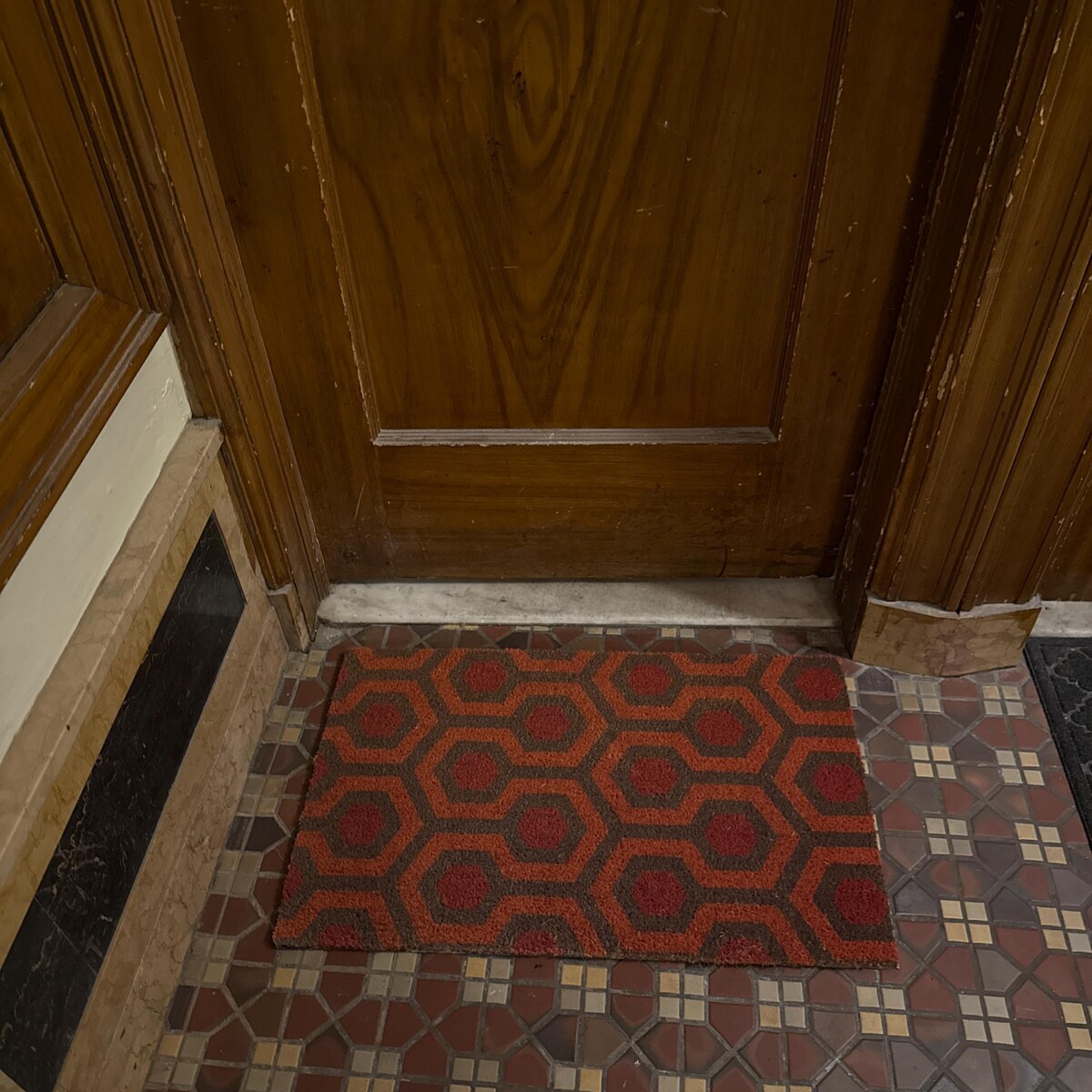orange and brown doormat pattern from the Overlook Hotel in The SHining