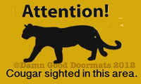 Attention! Cougar sighted in the area. funny doormat