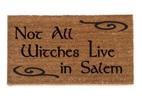 picture of a coir outdoor doormat reading "not all witches live in salem"