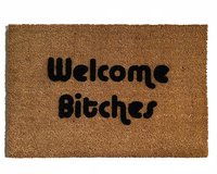 outdoor coir doormat with text "welcome bitches" on it