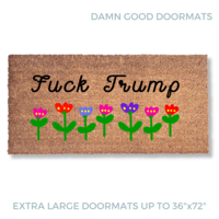 promotional image of a coir doormat reading "fuck Trump" in cursive with red and purple flowers across the top and bottom