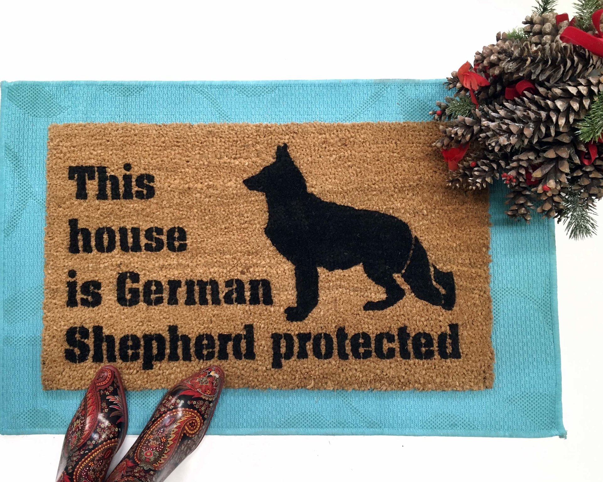 This house is German Shepard protected dog door mat