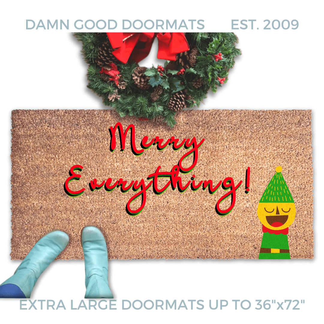 Merry Everything holiday doormat in red writing with a funny elf and blue boots
