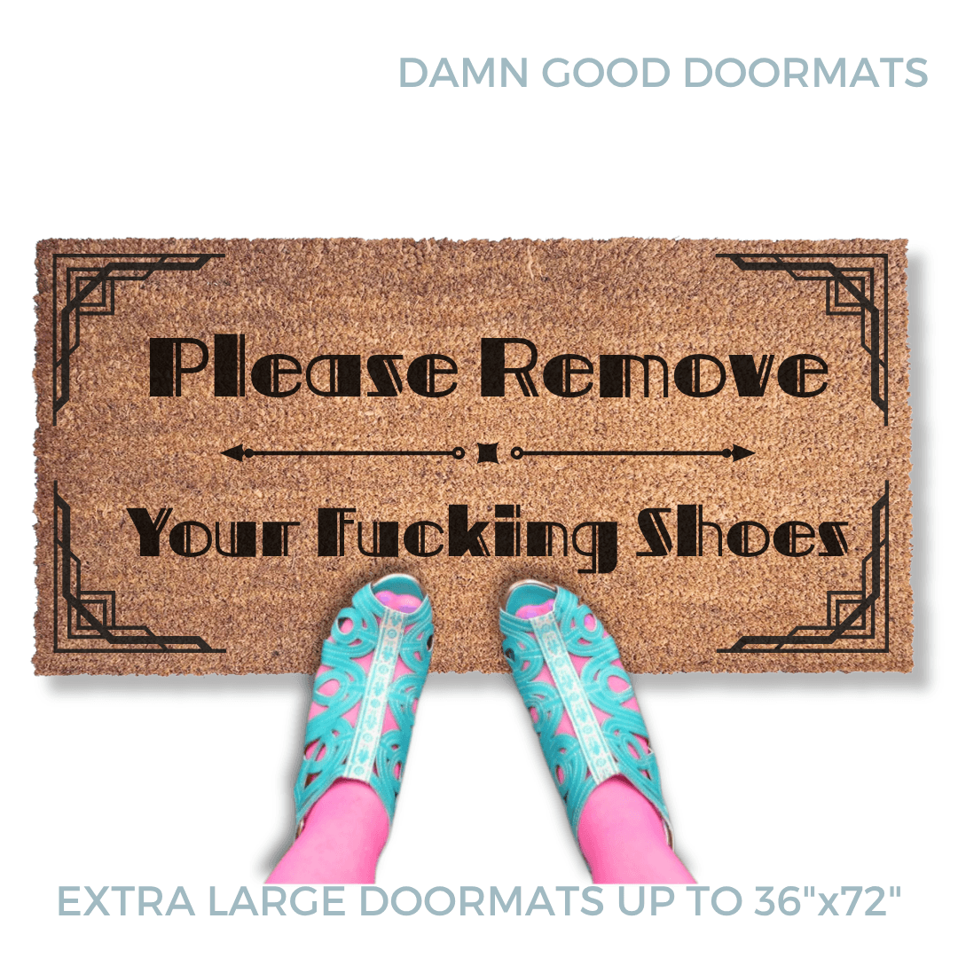 promotional image of a coir doormat reading "Please Remove your Fucking Shoes" . A person in blue cutout sandals and pink tights stands on the doormat
