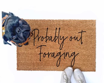 Probably out Foraging doormat pictured with a black pug