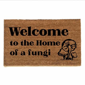 photo of outdoor coir doormat reading welcome to the home of a fungii mushrooms