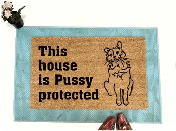 coir doormat reading This house is Pussy Protected with a drawing of a cat