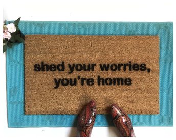 Shed your worries, you're home mantra doormat