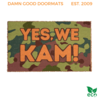 camouflage patterned doormat reading "Yes we Kam!" in bright orange